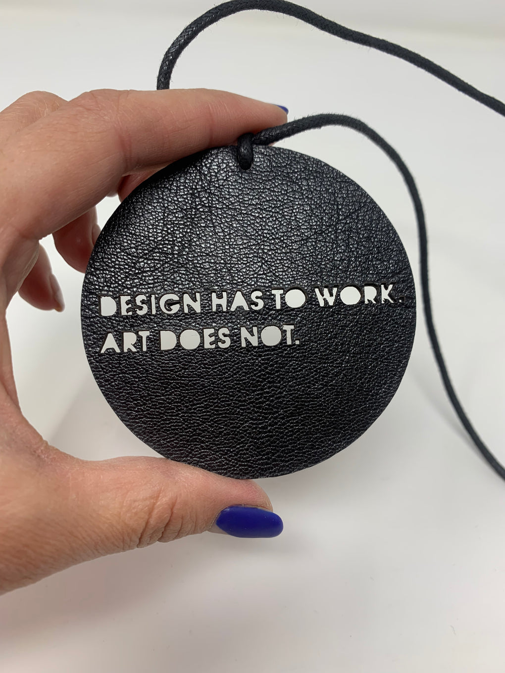 DESIGN HAS TO WORK ART DOES NOT колие
